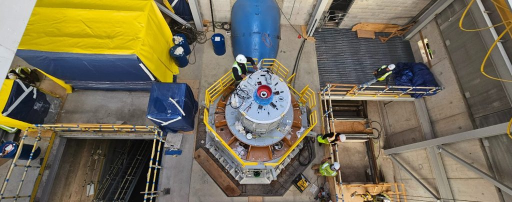 Installing a new hydroelectric turbine unit as part of a powerhouse reconstruction project at a dam in Minnesota. Photo taken by Josh Petersen President of Engineering Water Resource Specialist.